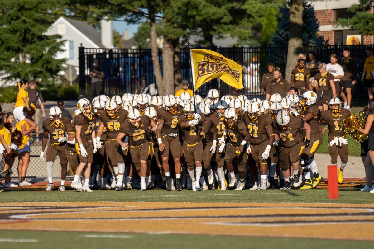 Rowan football runs onto the field before a game last season. Many of the players from 2021 are returning for the 2022 season. Saturday, September 4, 2021. - Photo / Joey Nicolo