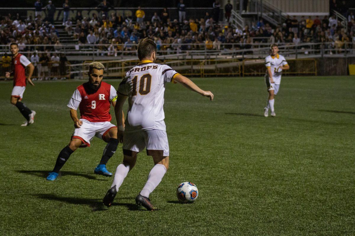 Chad Yates works his way around a defender. Yates scored two of the third goals on Saturday night. Saturday, Sept. 25, 2022. - Multimedia Editor / Lee Kotzen 