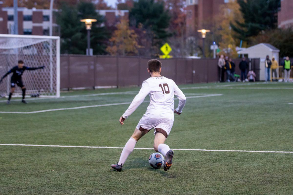 Chad Yates takes the ball towards the goal last season. Yates was a key factor in the Profs' first win of the season. Sunday, November 14, 2022. - Multimedia Editor / Lee Kotzen