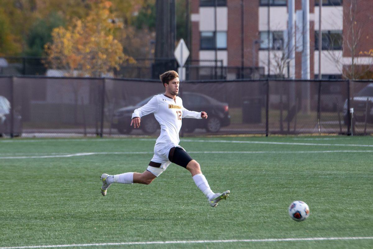 Jake Logar takes the ball up field. Logar has helped lead the team through the first half of the season. Sunday, Nov. 14, 2021. - Multimedia Editor / Lee Kotzen