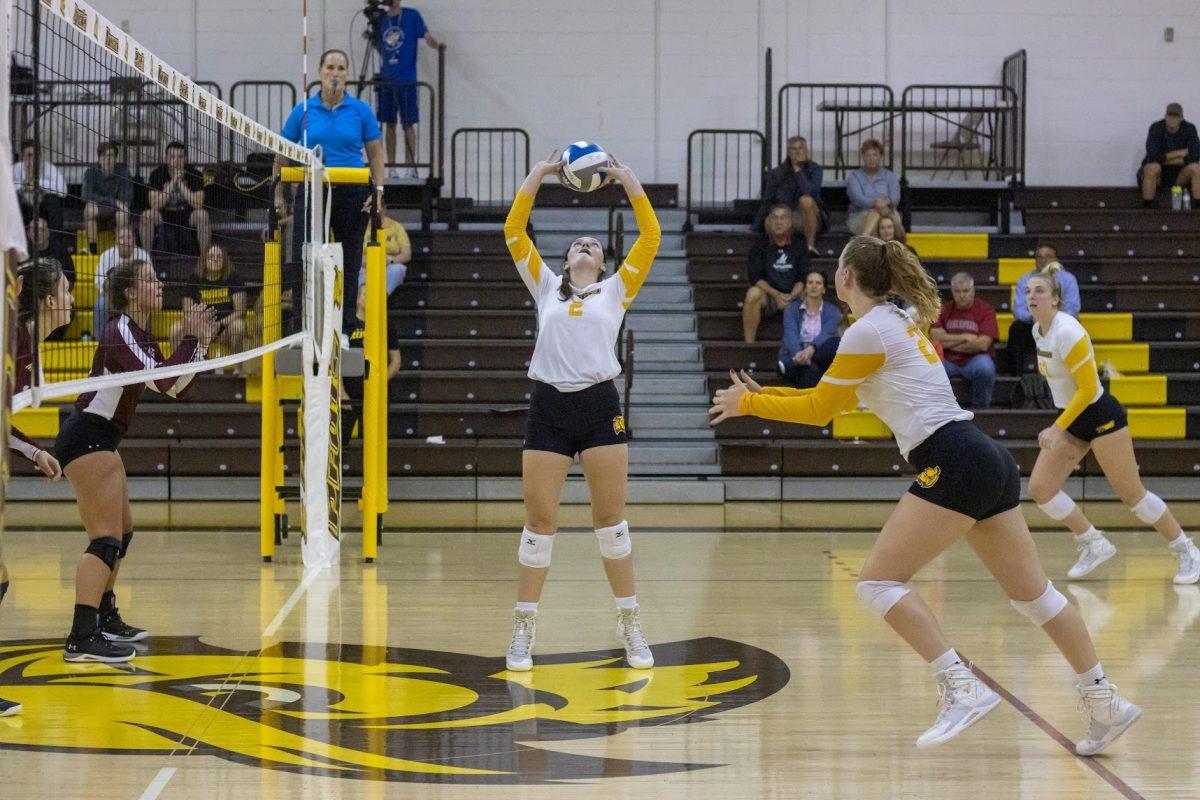 Brooke Adams sets the ball for Courtney Rhoden. Adams lead the team in assists with 27 on Thursday night. Tuesday, Sept. 6, 2022. - Multimedia Editor / Lee Kotzen