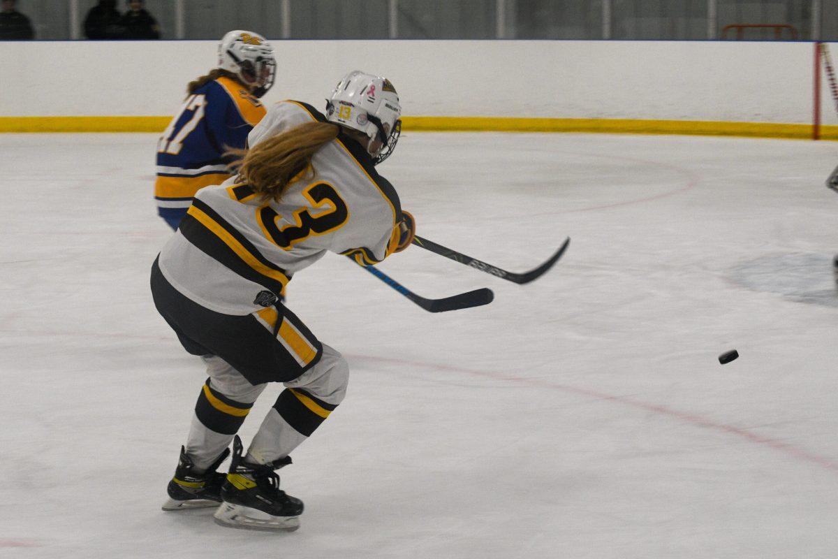 Micaiah "Tink" Tinklenberg shots the puck towards the goal. Tink recorded one of Rowan's nine goals against Pittsburgh. Sunday, Sept. 25, 2022. - Staff Photographer / Tyrese Williams