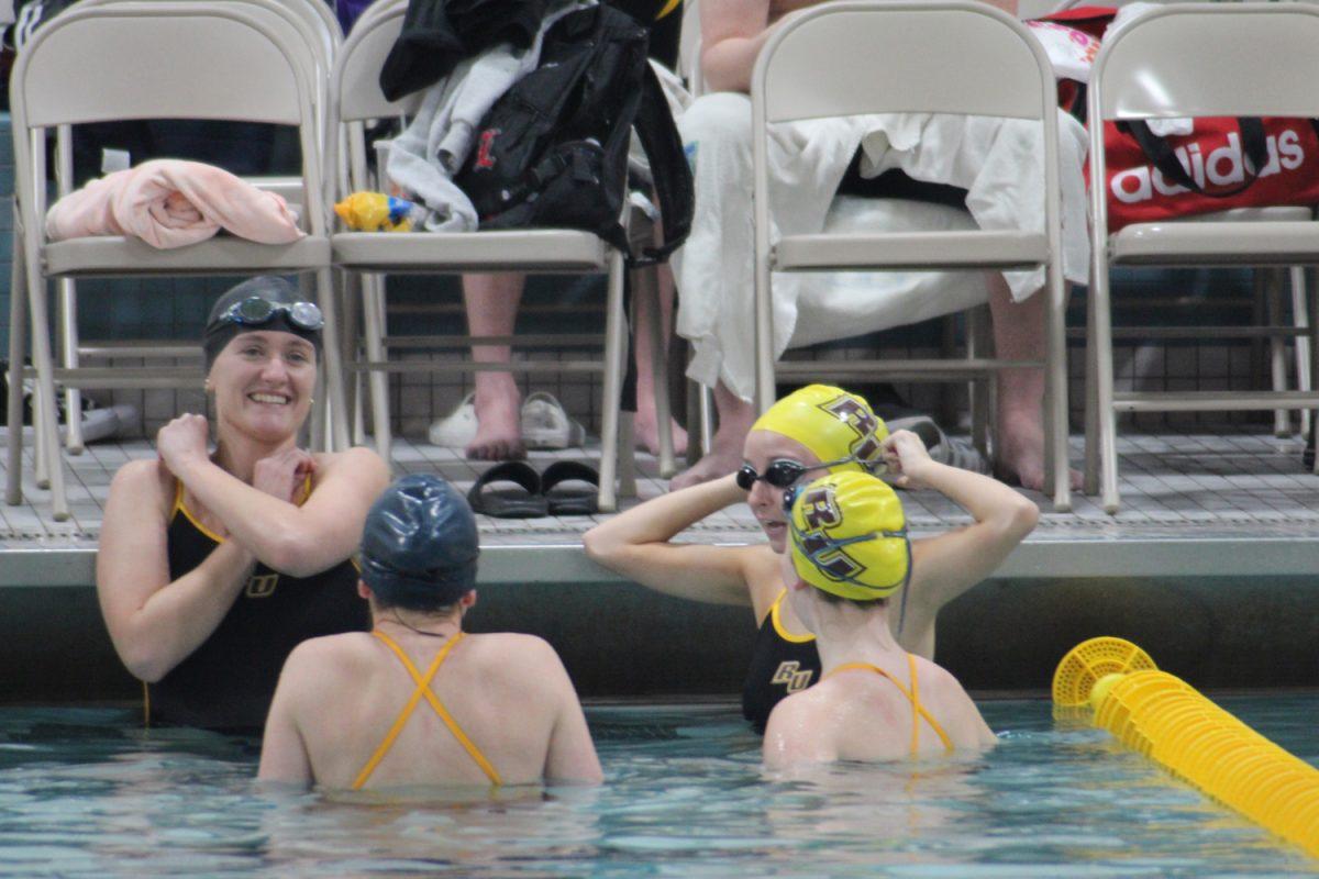 Rowan Club Swim members gather in the pool before a race. Rowan Club Swim hosted a 2022 meet earlier this year. - Photo via Rowan Club Swim's Proflink