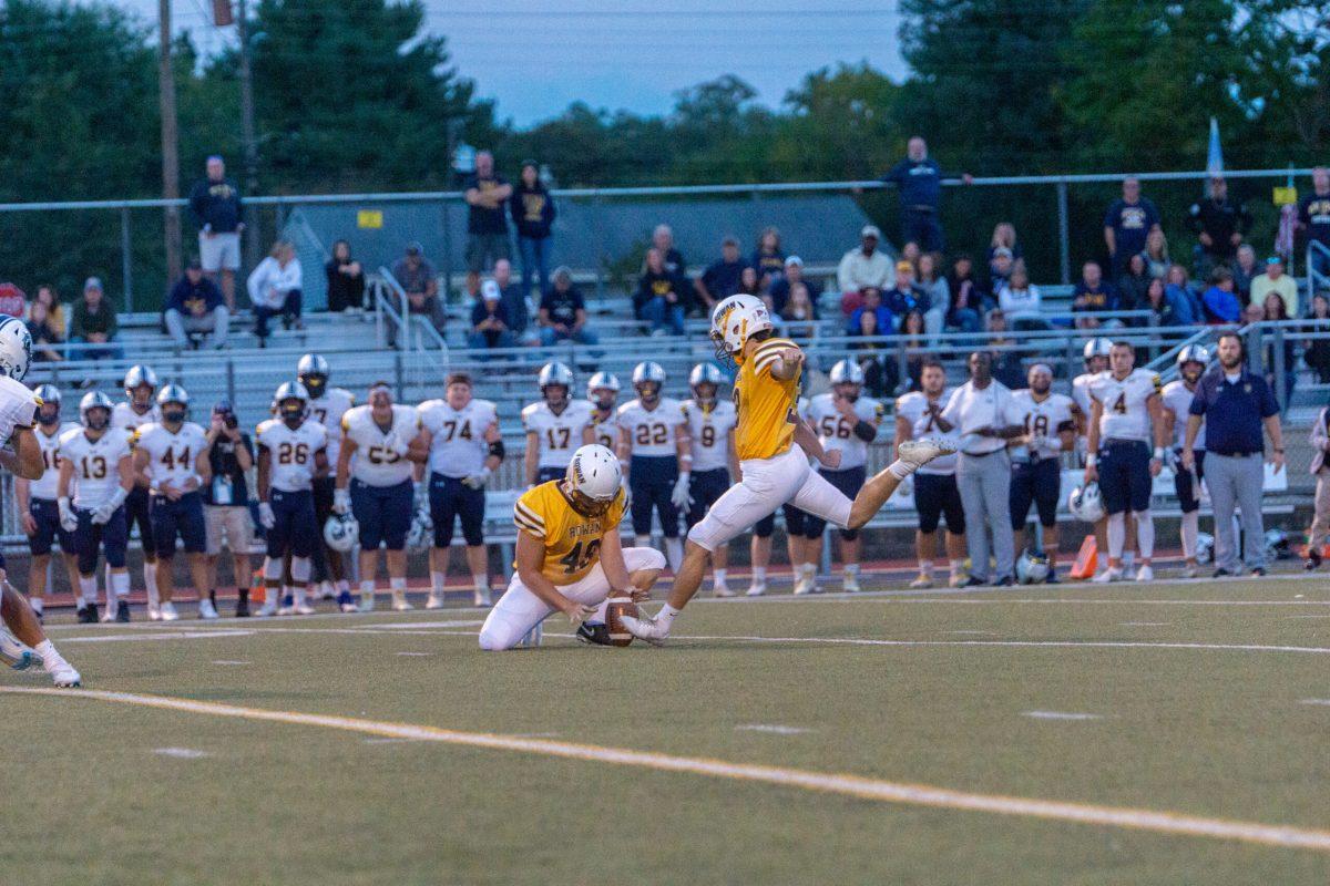 Jake Hurler attempts a field goal. Hurler kicked the game-winning field goal against TCNJ. Friday, Oct. 7, 2022. - Staff Photographer / Jarquil Young