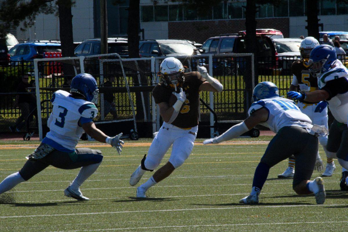 James Fara runs the ball up field. Fara ran for 99 yards and two touchdowns against Christopher Newport. Saturday, Sept. 24, 2022. - Staff Photographer / Tyrese Williams