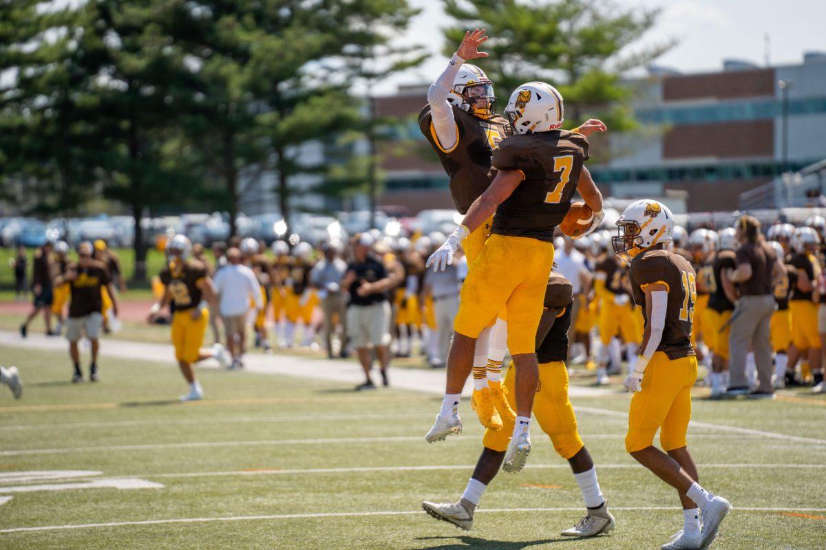 Mike Husni and John Maldonado celebrate after a touchdown. The QB and WR have been playing together for four years now. Saturday, Sept. 11, 2021. - Staff Photographer / Joey Nicolo