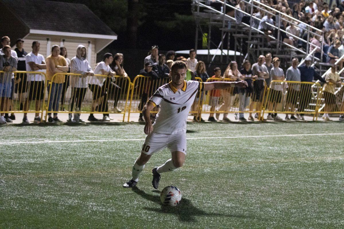 Chad Yates goes to kick the ball. Yates scored both goals on his senior night. Wednesday, Sep. 17, 2022. - Photo / Dom Francesconi via Rowan Athletics