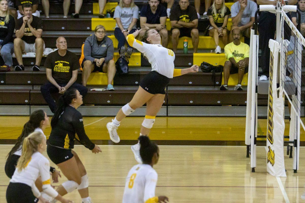 Natalie Ogden goes for a kill. Ogden has reached both a 1,000 kills and digs for her career. Saturday, Sept. 10, 2022. - Multimedia Editor / Lee Kotzen