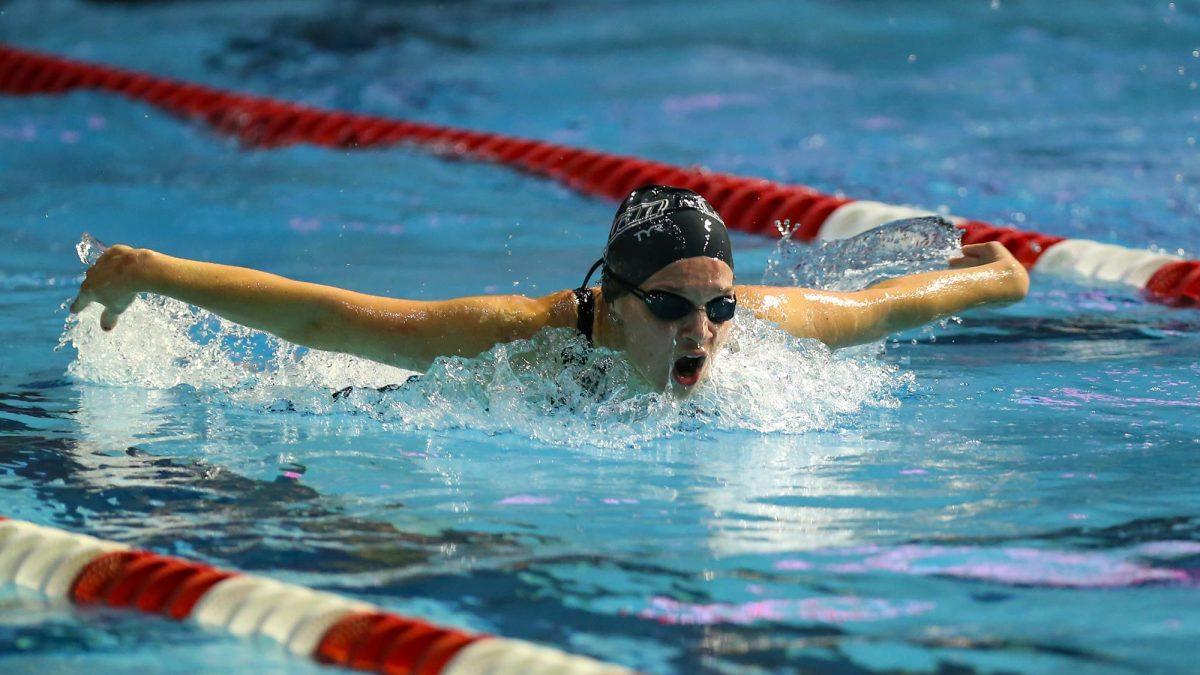 Abbi Schick swims in a race. Schick competed in multiple races against NYU. - Photo / Rowan Athletics