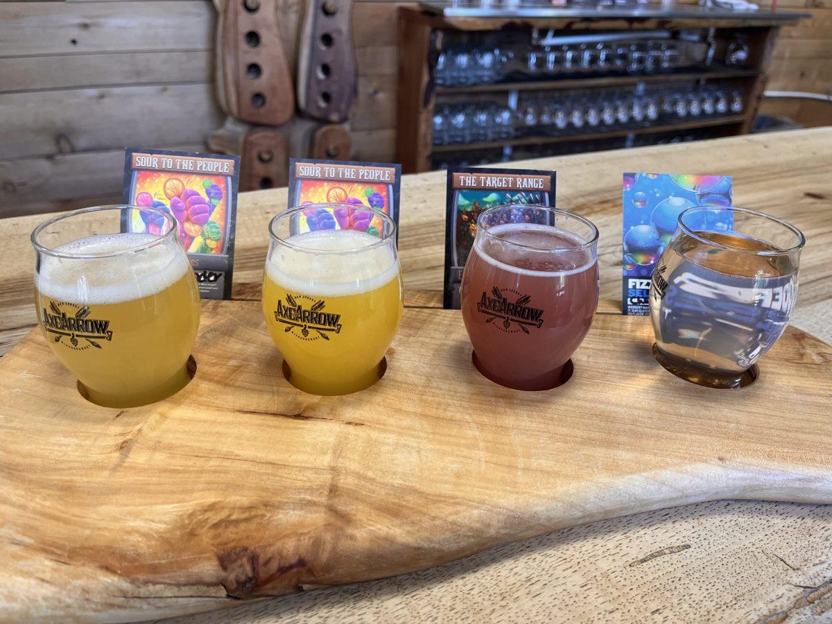 The flight of beer served at Axe and Arrow. - Staff Writer / Kariyah Bennett