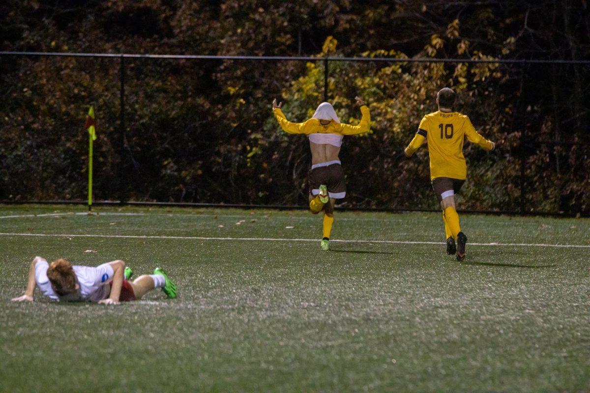 Davide Caputo (left) and Chad Yates celebrate after a Caputo goal. Caputo scored three goals in Rowan's NJAC Championship victory. Friday, Nov. 4, 2022. - Multimedia Editor / Lee Kotzen