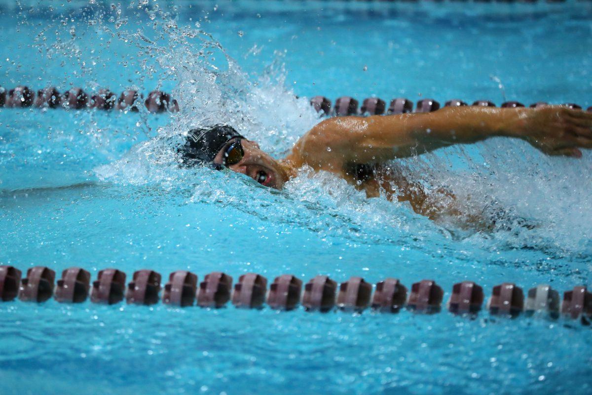 Paul Riter swims during a race. Riter is one of the veterans on the team. - Photo / Rowan Athletics