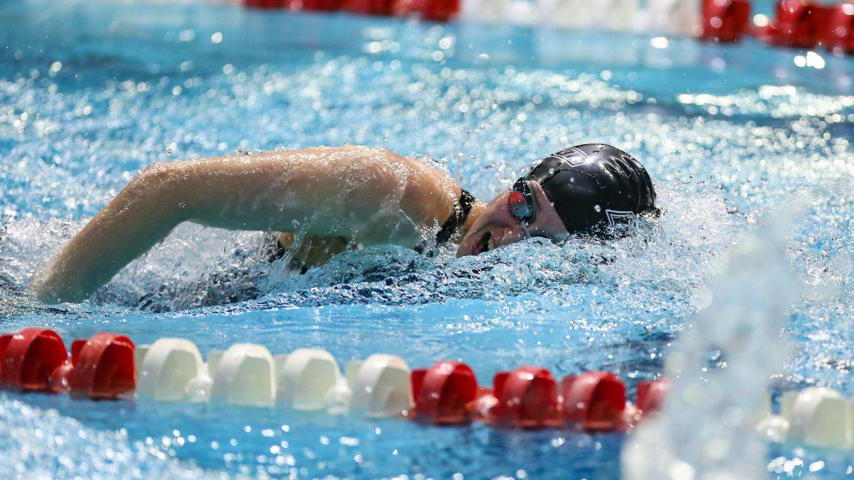 Elizabeth Jones swims in a meet. Jones competed in multiple meets this past weekend. - Photo / Rowan Athletics