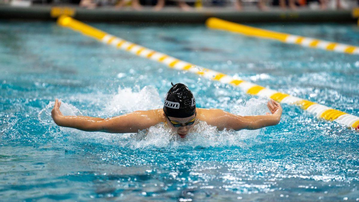 Alexis Kidchob swims in a race. Kidchob was one of the Profs that touched the wall first last Tuesday. - Photo / Rowan Athletics