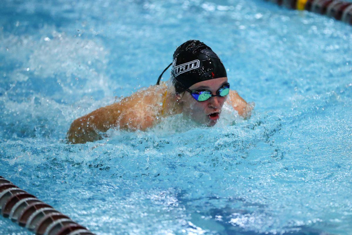 Ella Pennington competes in race. Pennington broke multiple school records this weekend. - Photo / Rowan Athletics