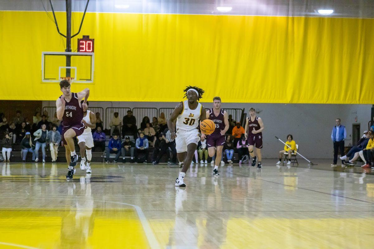 Josh Wright goes on a fast break. Wright provided double-digit points again Cabrini. Tuesday, Nov. 8, 2022. - Multimedia Editor / Lee Kotzen