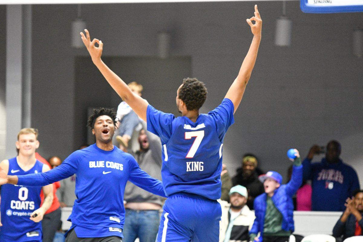 Louis King celebrates after hitting the game-winning three-pointer. King's shot in overtime put the Blue Coats over the edge against the Nets. Friday, Dec. 30, 2022. - Staff Photographer / Tyrese Williams