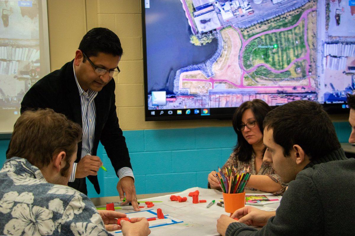 Meenar helping to plan better community development with other programs using a variety of different techniques. - Photo via Rowan University