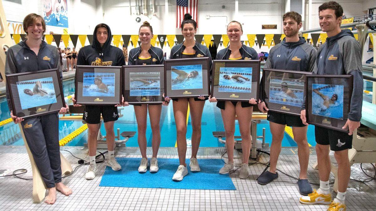 Rowan women's swimming poses next to men's swimming for Senior Day. - Photo / Rowan Athletics