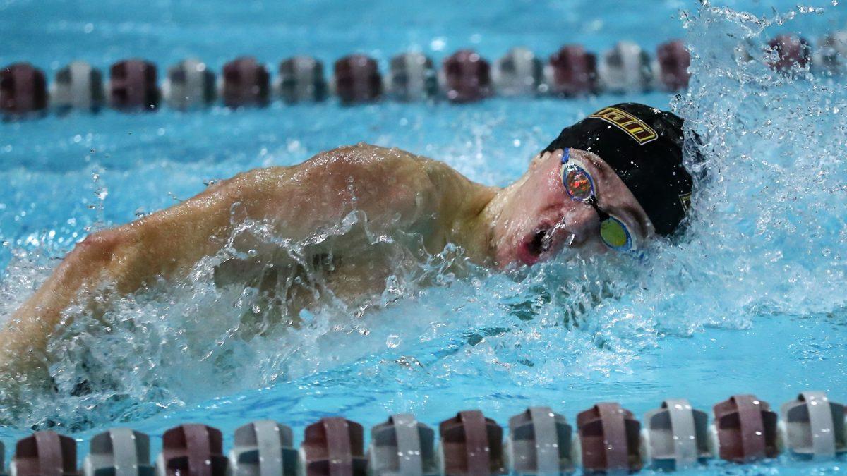 Jack Watson swims in a race. Watson has been one of the top swimmers for the Profs this season - Photo / Larry Levanti via Rowan Athletics