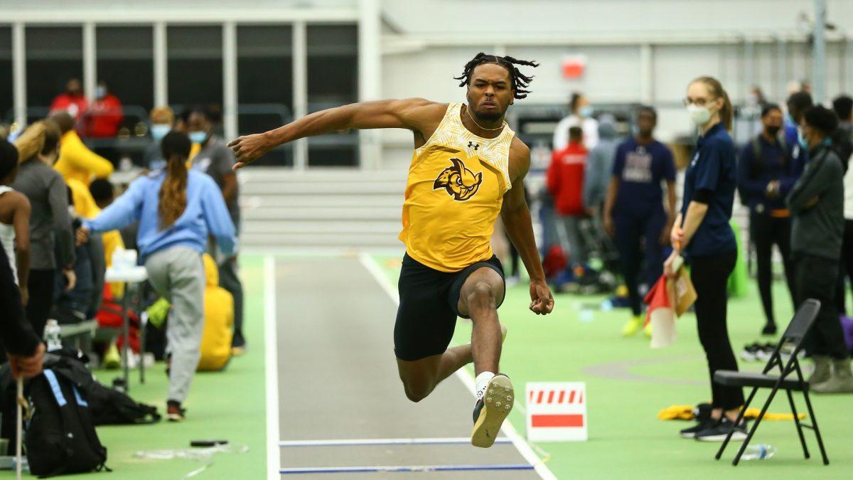 Ahmir Johnson competes in the long jump. Johnson broke a 32-year school record in the event - Photo / Rowan Athletics