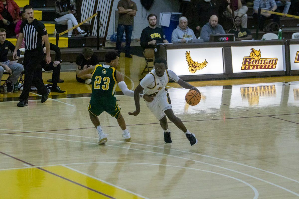 Marcellus Ross drives past a NJCU player. Ross is one of the five Profs averaging plus ten points this season. Wednesday, Jan. 4, 2023. - Multimedia Editor / Lee Kotzen