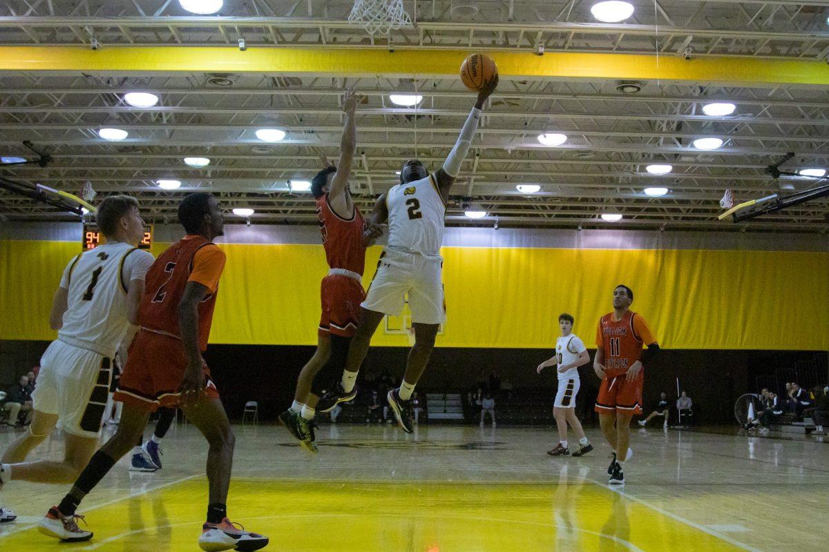 Marcellus Ross goes up for a layup. Ross has been one of the top contributors both last season and this year. Saturday, Dec. 3, 2022. - Multimedia Editor / Lee Kotzen 