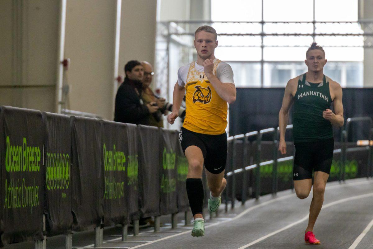 Evan Corcoran sprints in a race. Corcoran is one of the options to run in the 4x400 race for the Profs. Friday, Feb. 3, 2023. - Multimedia Editor / Lee Kotzen