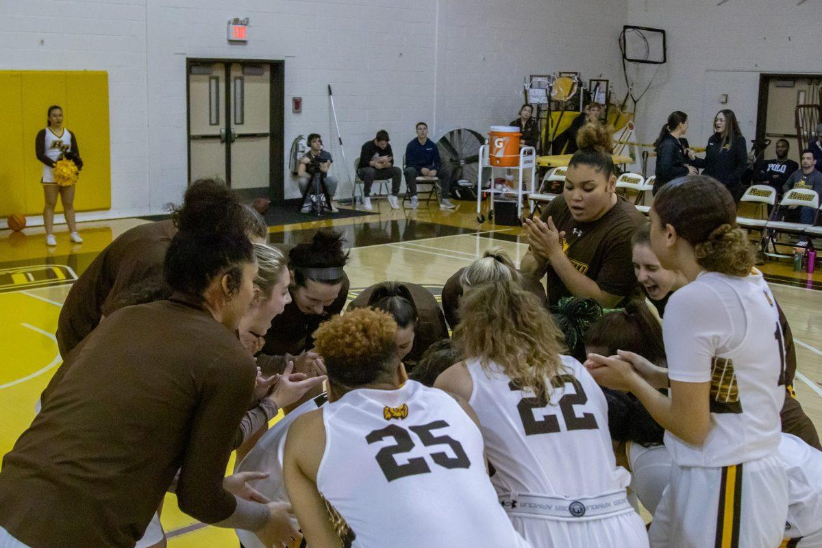 Rowan women's basketball team in a huddle before a game. The team has gone 12-5 in conference play. Wednesday, Feb. 1, 2023. - Multimedia Editor / Lee Kotzen