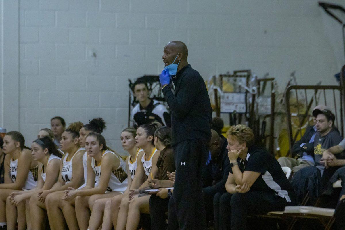 Coach Demetrius Poles coaches his team from the sideline. Coach Poles was named NJAC Coach of the Year this season. Wednesday, Jan. 4, 2023. - Multimedia Editor / Lee Kotzen