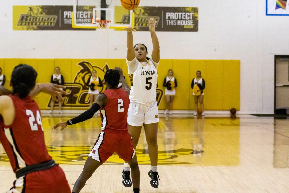 Nicole Mallard takes the shot that would be her 1,000th point. Mallard is the only current member of the roster to reach this milestone at Rowan. Wednesday, Feb. 1, 2023. - Multimedia Editor / Lee Kotzen