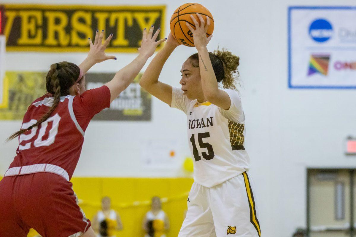 Dakota Adams controls the ball. Adams recorded a double-double in the NJAC Opening Round. Wednesday, Feb. 15, 2023. - Multimedia Editor / Lee Kotzen