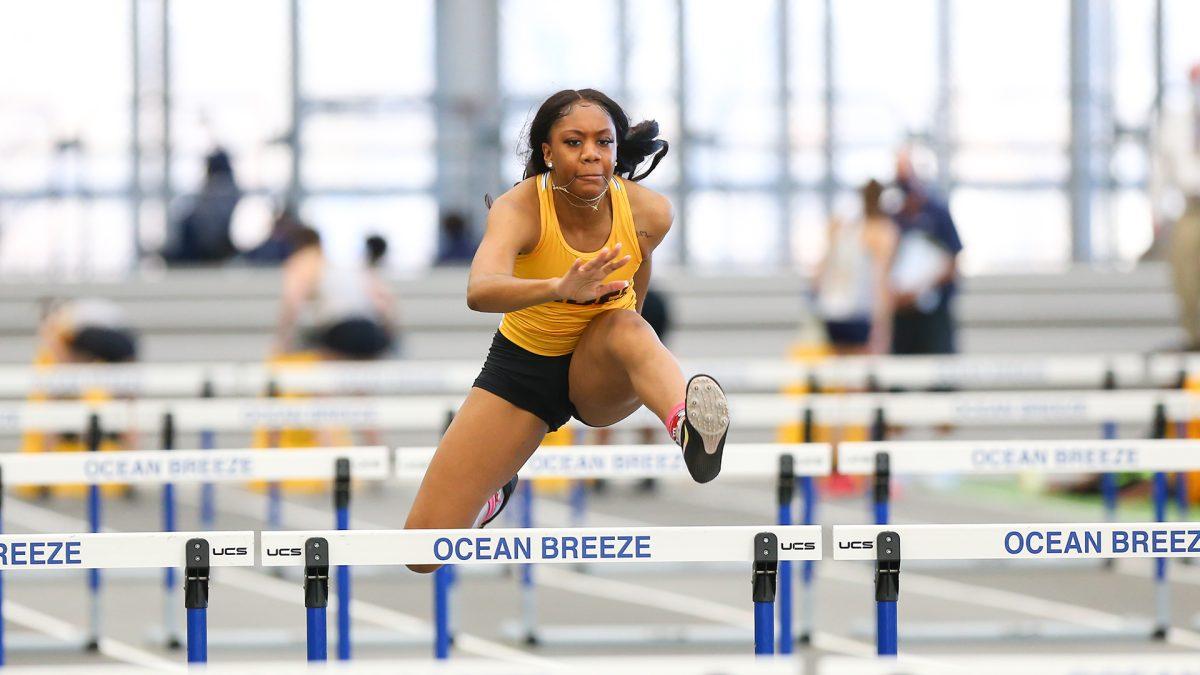 Gloria Hughes competes in a hurdles event. Hughes had one of the best performances of the weekend for the Profs. - Photo / Rowan Athletics