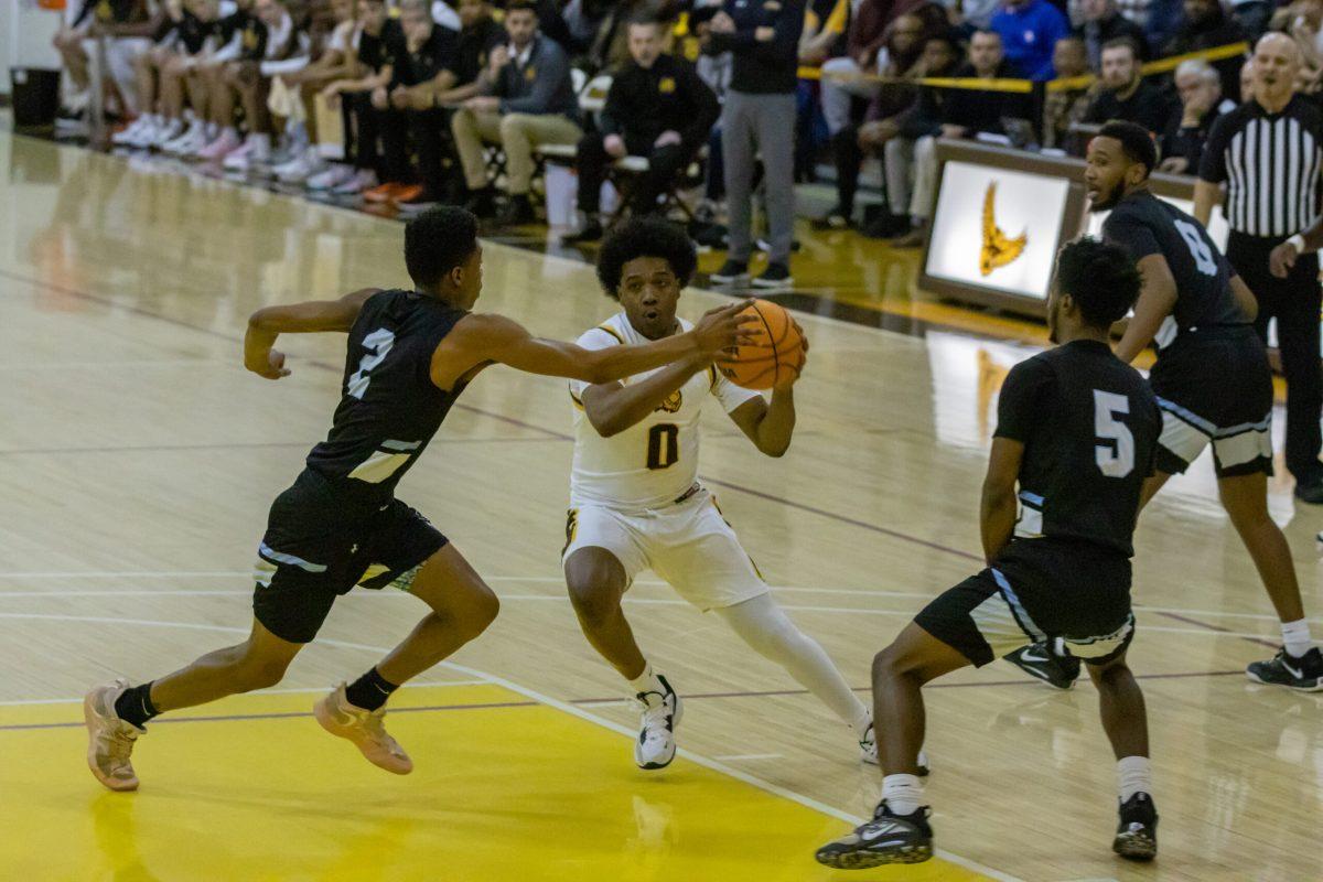 Hafeez Melvin drives to the basket. Melvin contributed 15 points off the bench against Rutgers-Camden. Wednesday, Jan. 18, 2023. - Multimedia Editor / Lee Kotzen