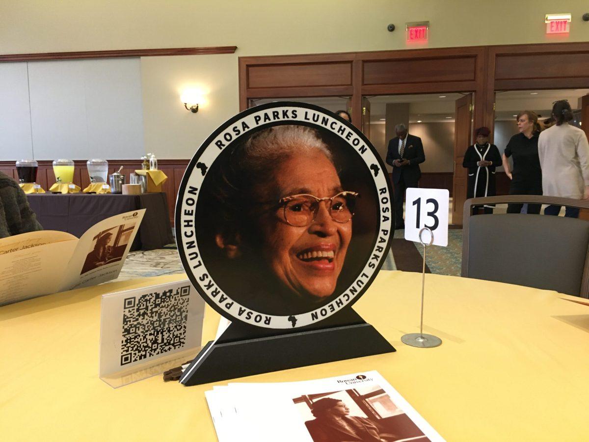 Centerpieces with Rosa Parks' photo sat on the table of the luncheon. - News Intern / Abigail Twiford