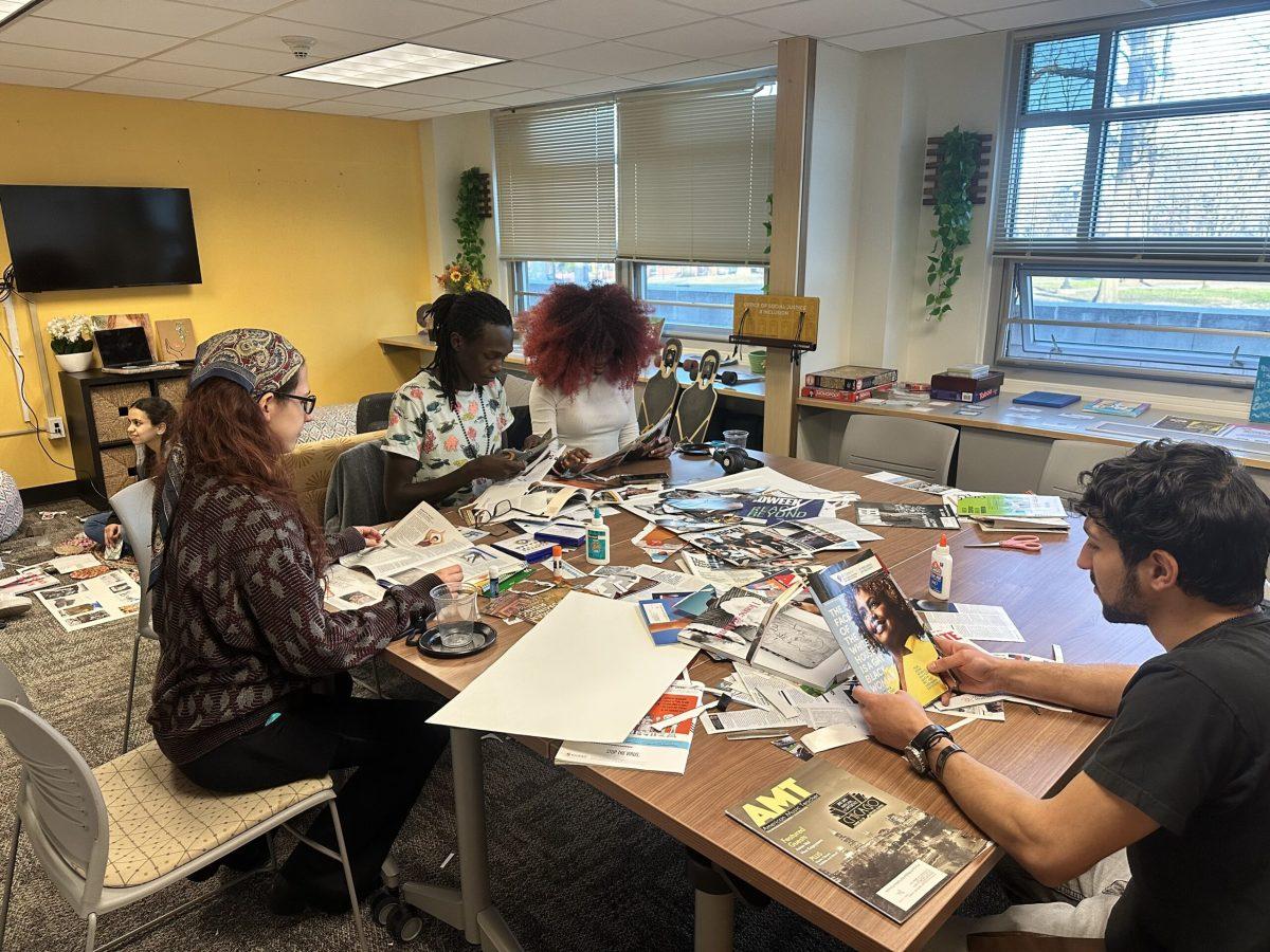 Students work through various magazine clippings to include in their vision boards. - Intern / Bryant Lopez