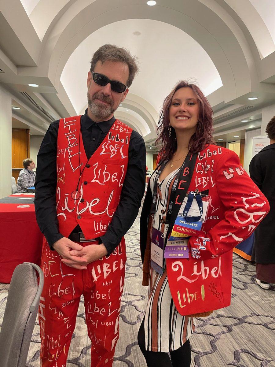 Michael Koretzky, Society of Professional Journalists (SPJ) member, stands next to Michaels at an SPJ conference. Michaels is wearing his hand-painted Libel suit jacket. - Copy Editor / Sylent Lee Michaels 