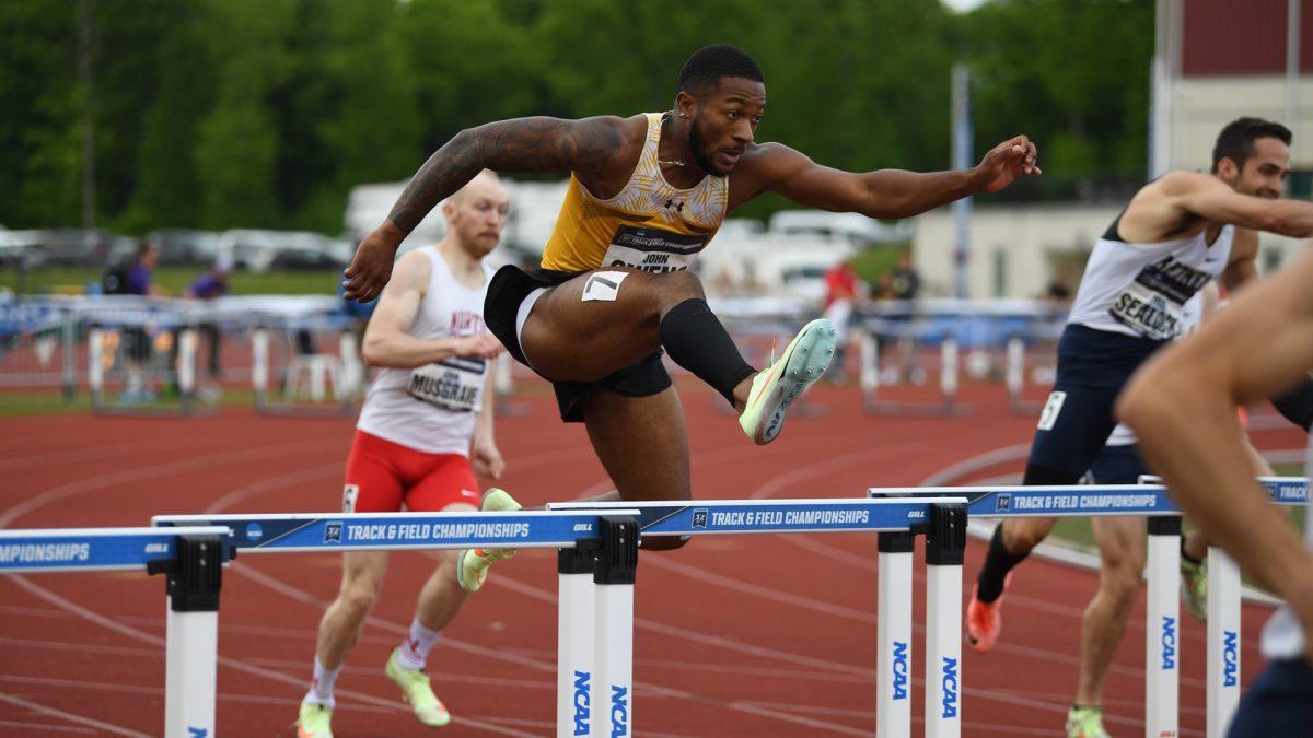 John Owens participates in a race. - Photo via Rowan Athletics