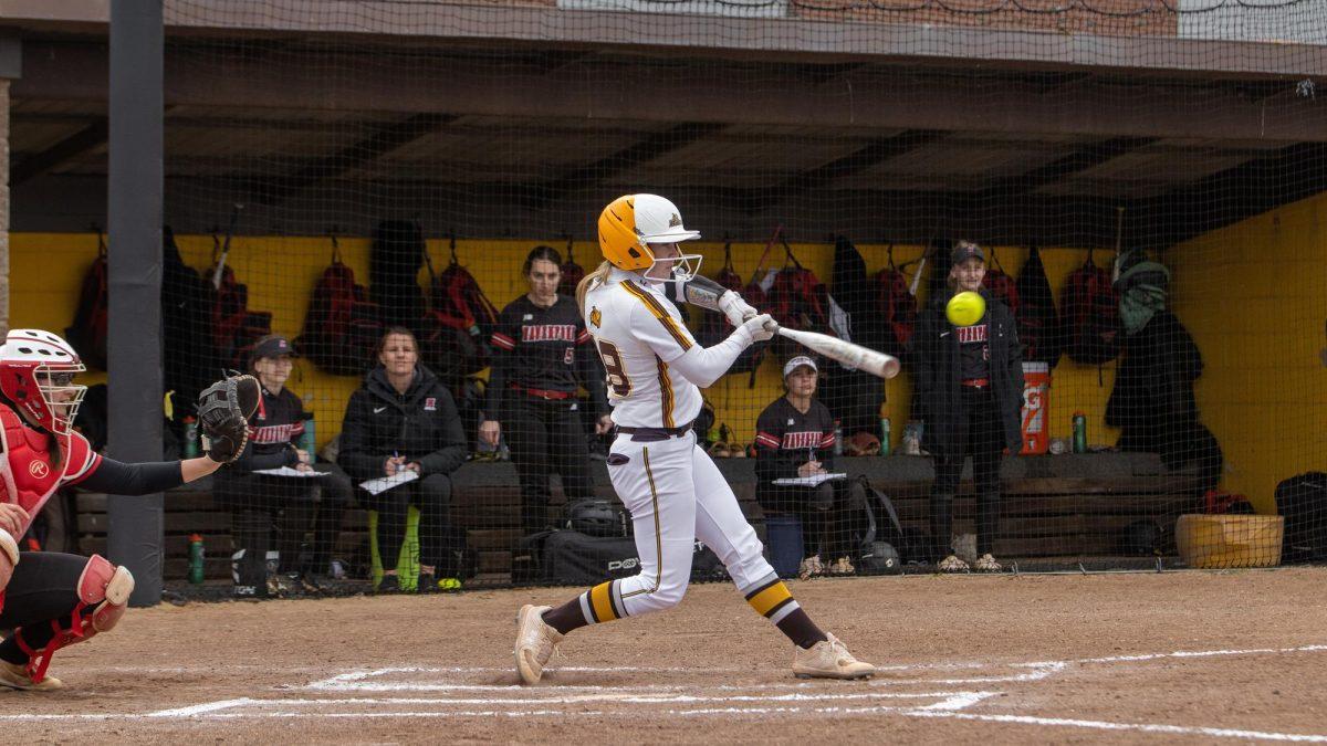 Liz McCaffery swings at a pitch. McCaffery recorded five hits and two RBIs over the weekend. - Photo / Rowan Athletics