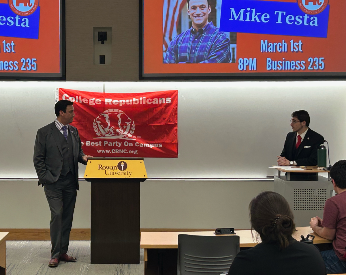 Mike Testa answers a question from Rowan University College Republicans President Eric Holmes. - Contributor / Donald Yamasaki