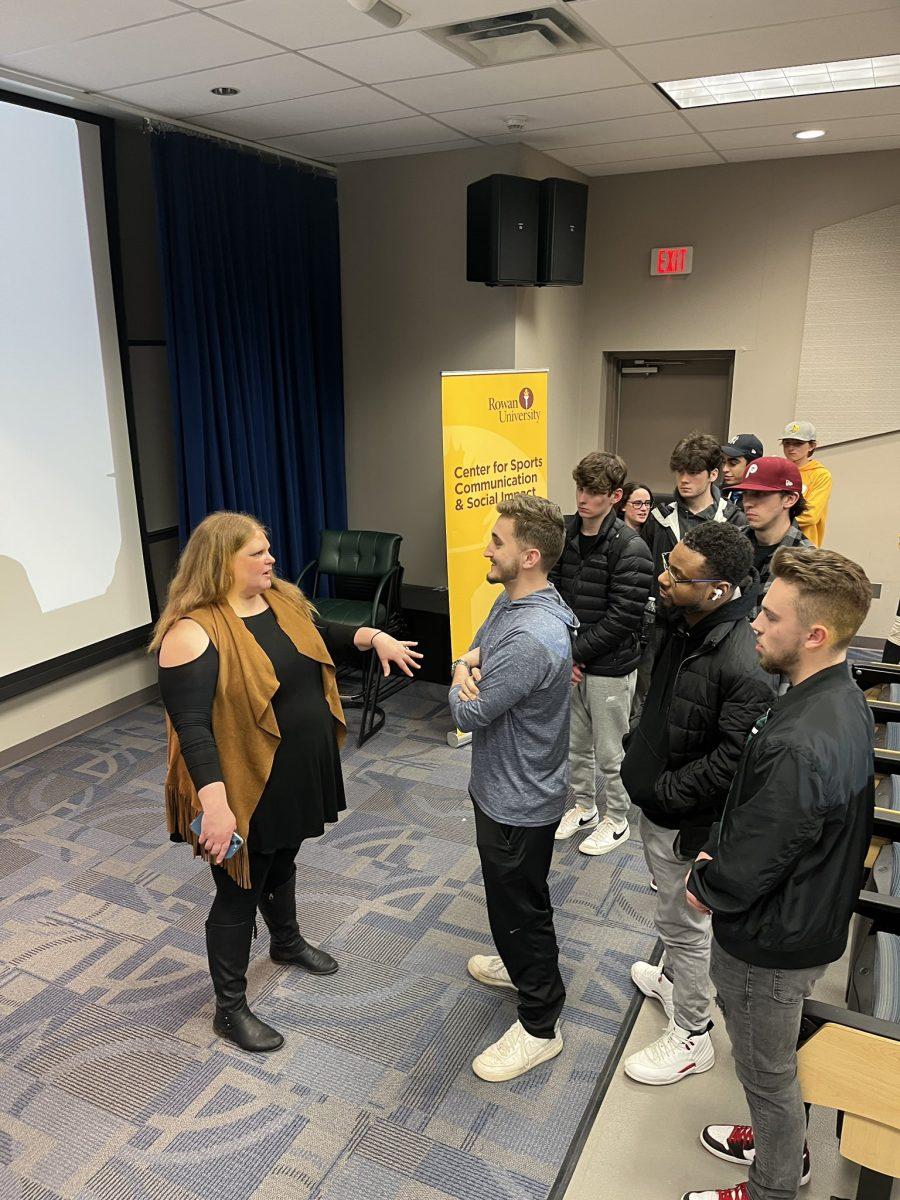 WIP Assistant Brand Manager Ava Graham spending time with students after "Pizza With The Pros". - Photo via @rowansportscam on Twitter