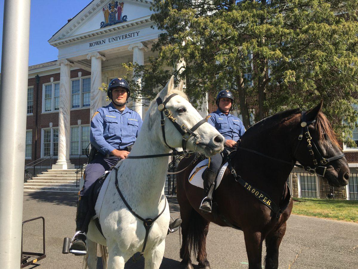 NJ State Police Officers Krzaczkowski and Donahue riding their horses, Pepe and Phantom, at the 2023 Law & Justice Day at Bunce Green Circle. - News Intern / Abigail Twiford