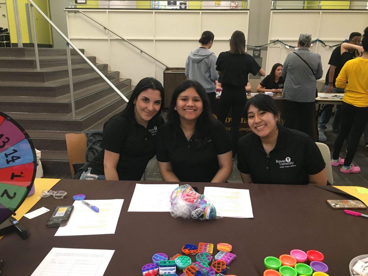 From left to right, Alexia Jovanovic, Alexa Delgado and Kathleen Ramos, the Healthy Campus Initiative interns tabling at the event. - News Intern / Abigail Twiford