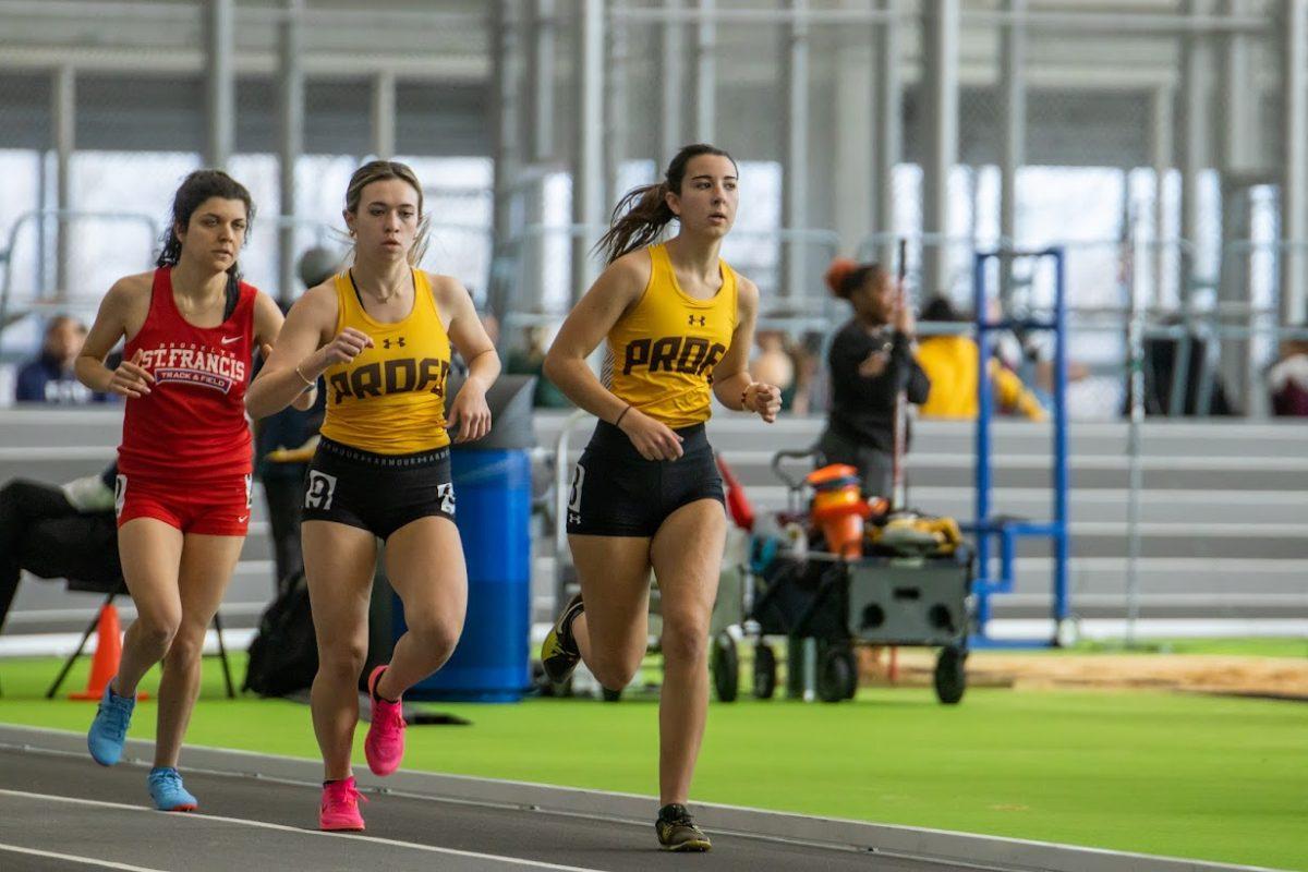 Olivia Shafer (left) and Mia Vaughn (right) participate in a race. Thursday, Feb. 2, 2023. - Multimedia Editor / Lee Kotzen