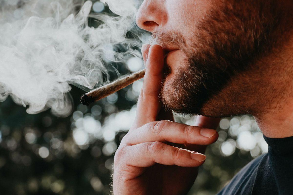 A person consuming marijuana through smoke inhalation. Photo via Wikipedia Creative Commons