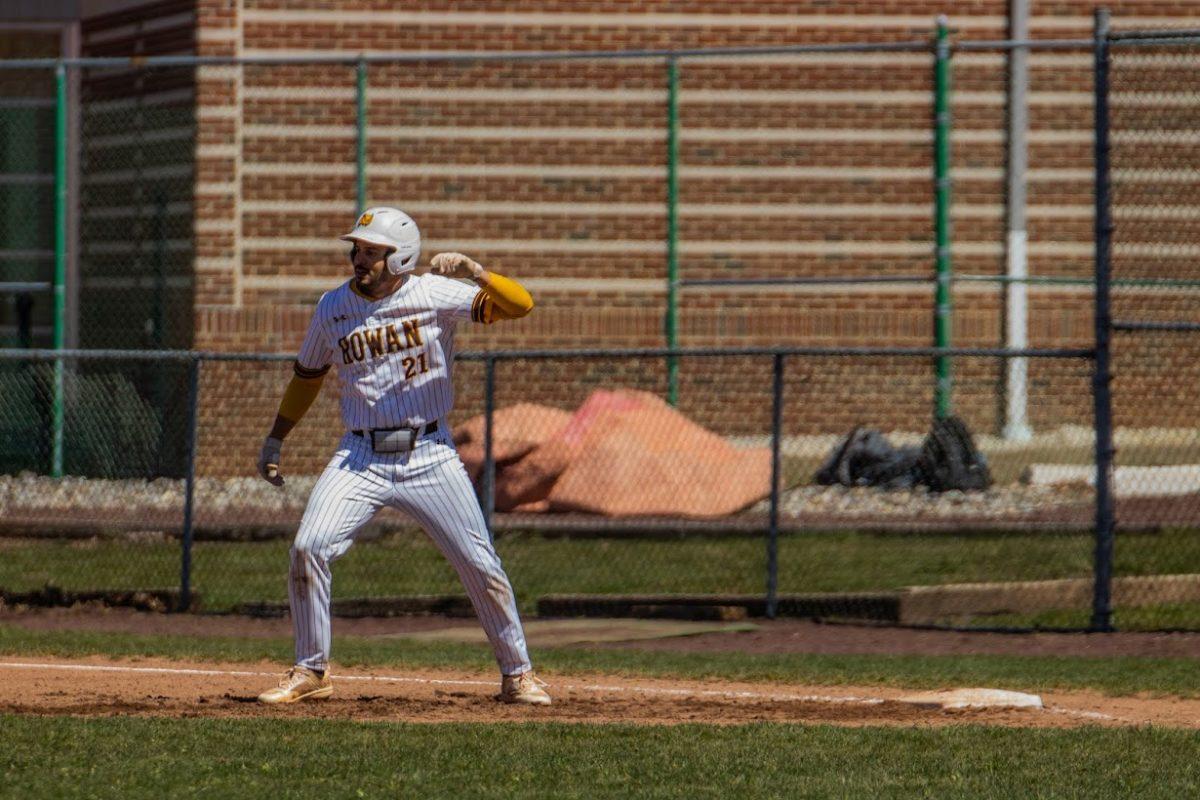 Dylan Maria celebrates a hit. Maria recorded a team-high six hits in Rowan's doubleheader against William Paterson. Saturday, April 2, 2023. - Multimedia Editor / Lee Kotzen.