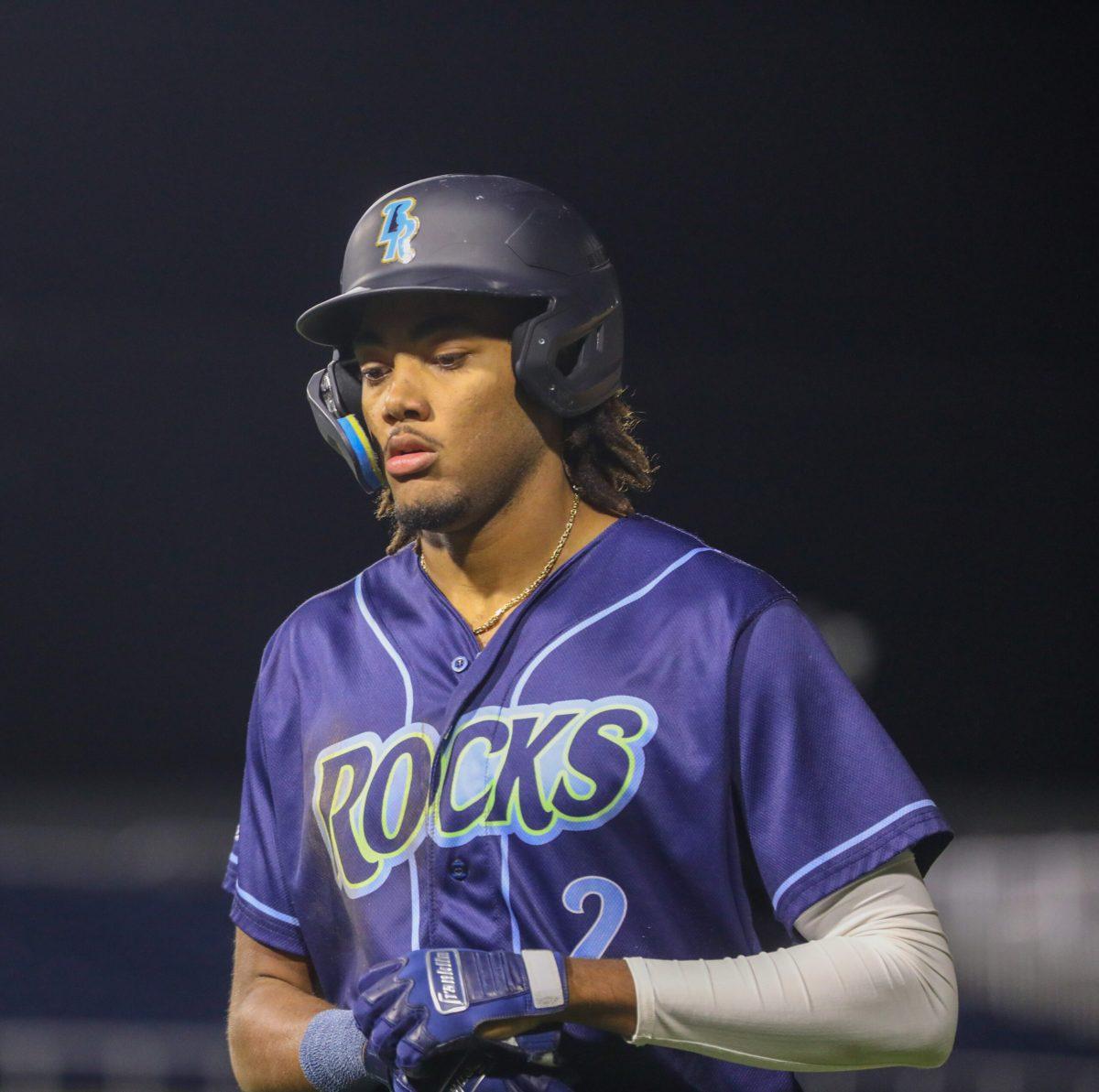 James Wood walking back to the dugout removing his batting gloves. Tuesday, May 9, 2023. - Staff photographer / Joe Capuyan