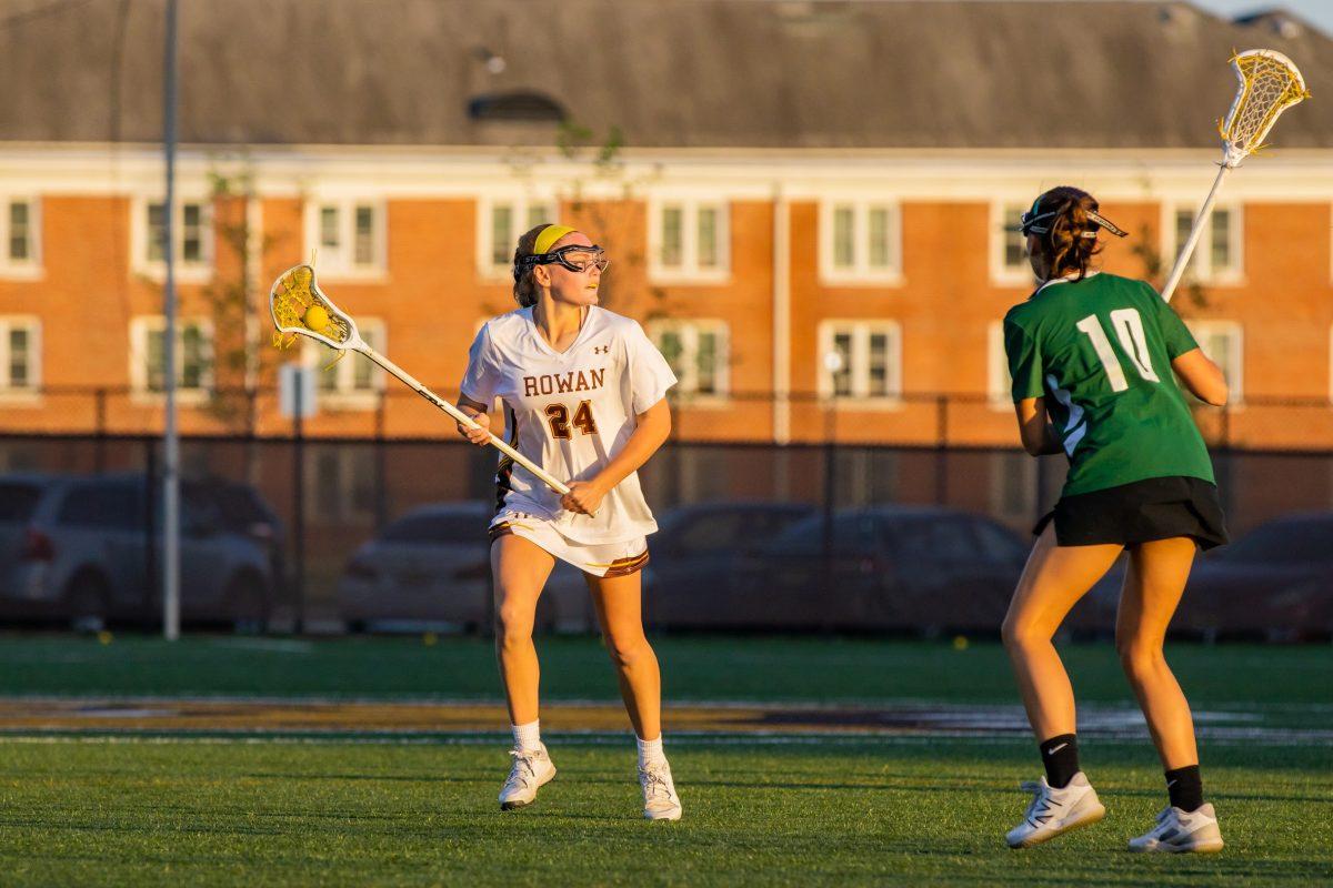 Molly Green looks to score. Green caused three turnovers and scored two goals in the regular season finale. Wednesday, April 19, 2023. - Multimedia Editor / Lee Kotzen