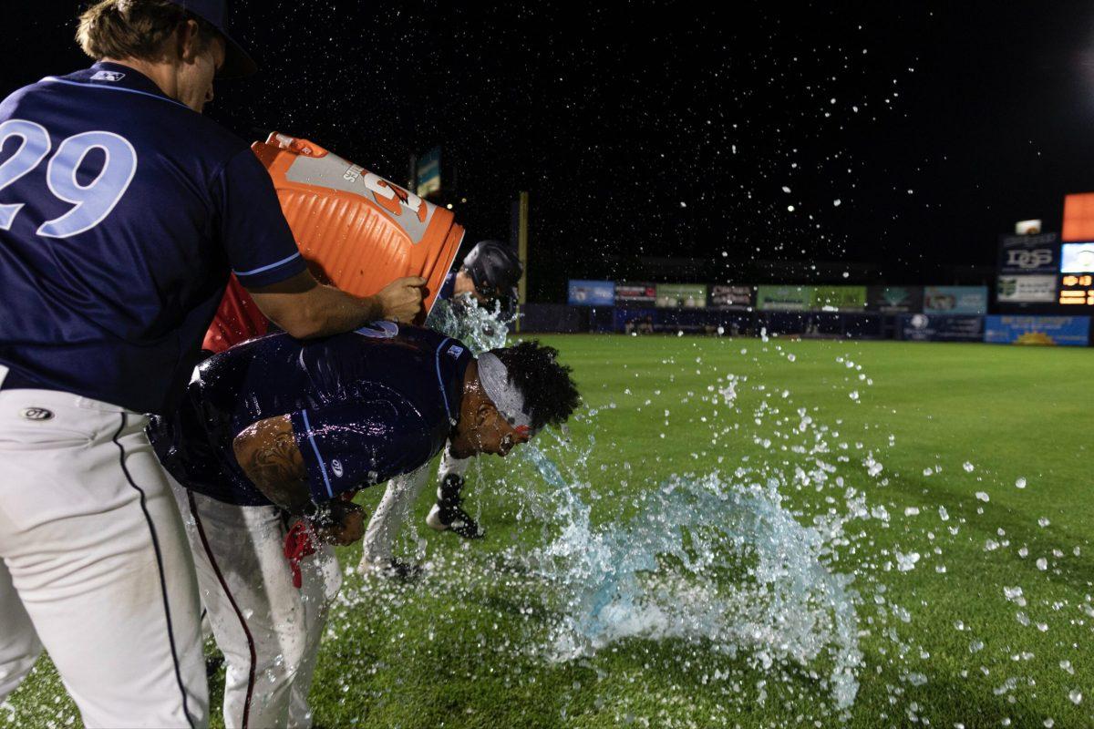 Leandro Emiliani gets showered following his walk-off hit. - Photo via @WilmBlueRocks on Twitter