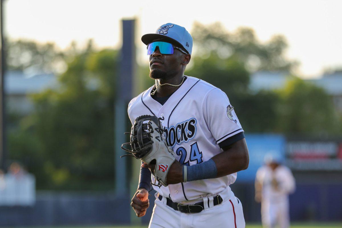 First basemen T.J. White sporting a sparkling set of Oakley's. Friday July 21st, 2023. - Staff Photographer / Tyrese Williams